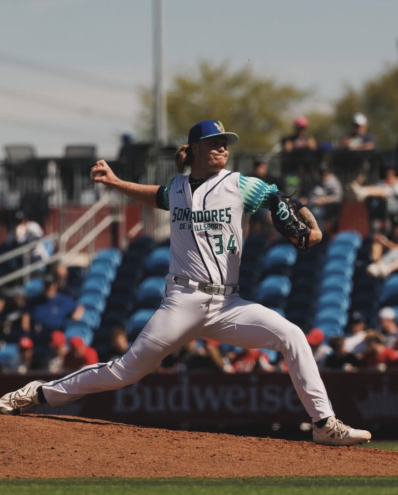 Apex Motion athlete mid-delivery on the mound